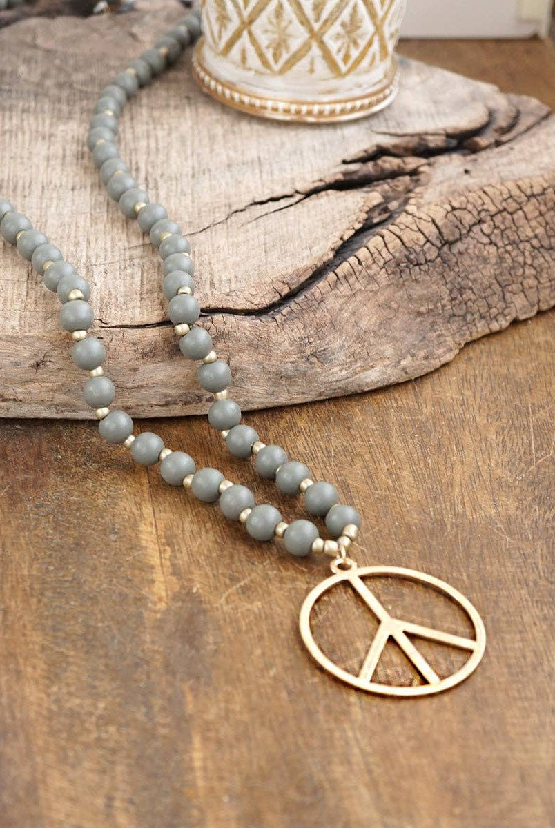 Long Wood Bead Necklace with golden peace sign pendant - Gray-Necklaces-PennyLine inc-Stuffology - Where Vintage Meets Modern, A Boutique for Real Women in Crosbyton, TX