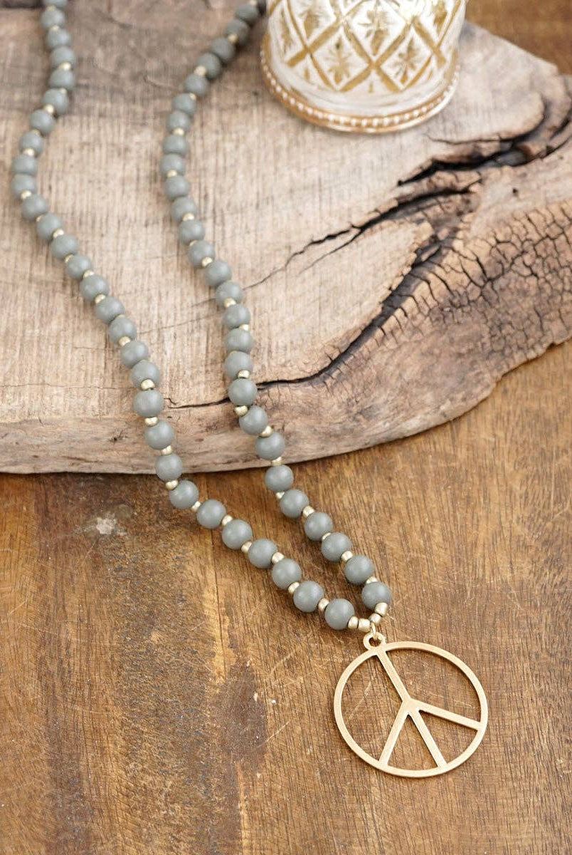 Long Wood Bead Necklace with golden peace sign pendant - Gray-Necklaces-PennyLine inc-Stuffology - Where Vintage Meets Modern, A Boutique for Real Women in Crosbyton, TX