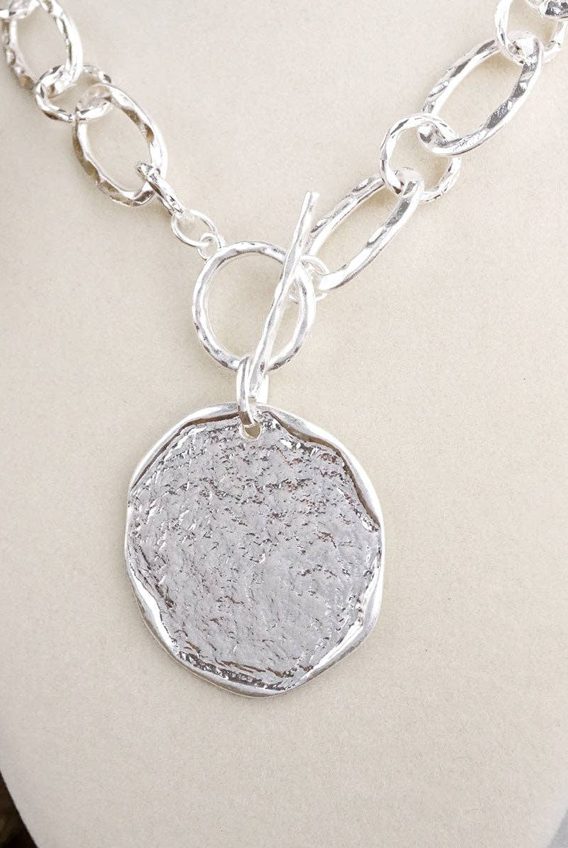 Nomad Glow – Front Toggle Statement Necklace with Hammered Disc-Necklaces-PennyLine inc-Stuffology - Where Vintage Meets Modern, A Boutique for Real Women in Crosbyton, TX