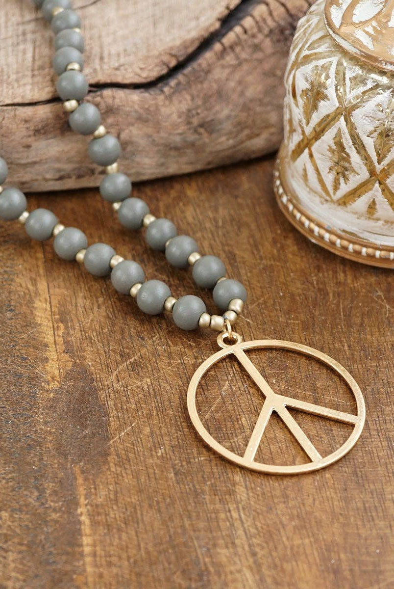 Long Wood Bead Necklace with golden peace sign pendant - Gray-Necklaces-PennyLine inc-Stuffology - Where Vintage Meets Modern, A Boutique for Real Women in Crosbyton, TX