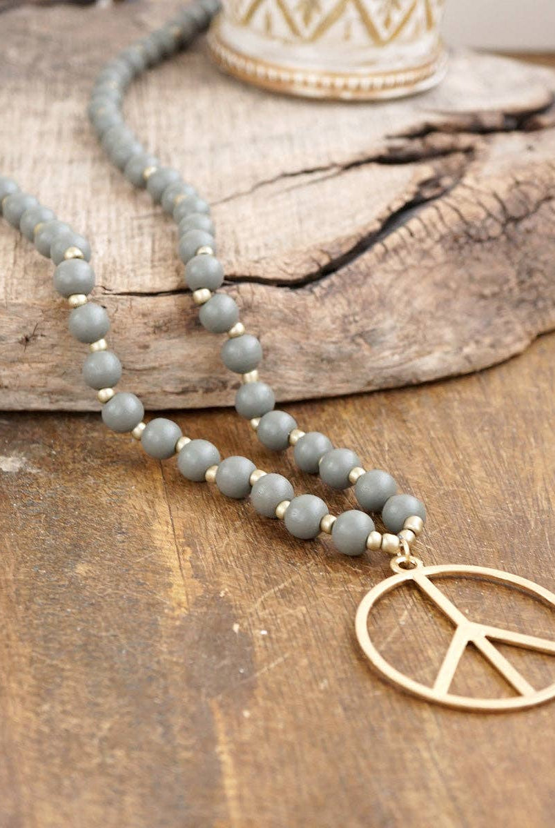 Long Wood Bead Necklace with golden peace sign pendant - Gray-Necklaces-PennyLine inc-Stuffology - Where Vintage Meets Modern, A Boutique for Real Women in Crosbyton, TX