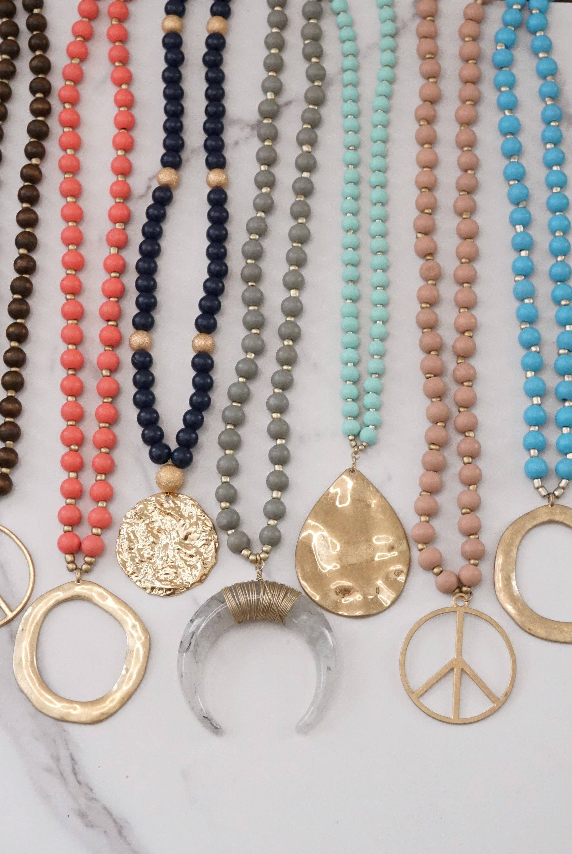 Long Wood Bead Necklace with golden peace sign pendant - Gray-Necklaces-PennyLine inc-Stuffology - Where Vintage Meets Modern, A Boutique for Real Women in Crosbyton, TX