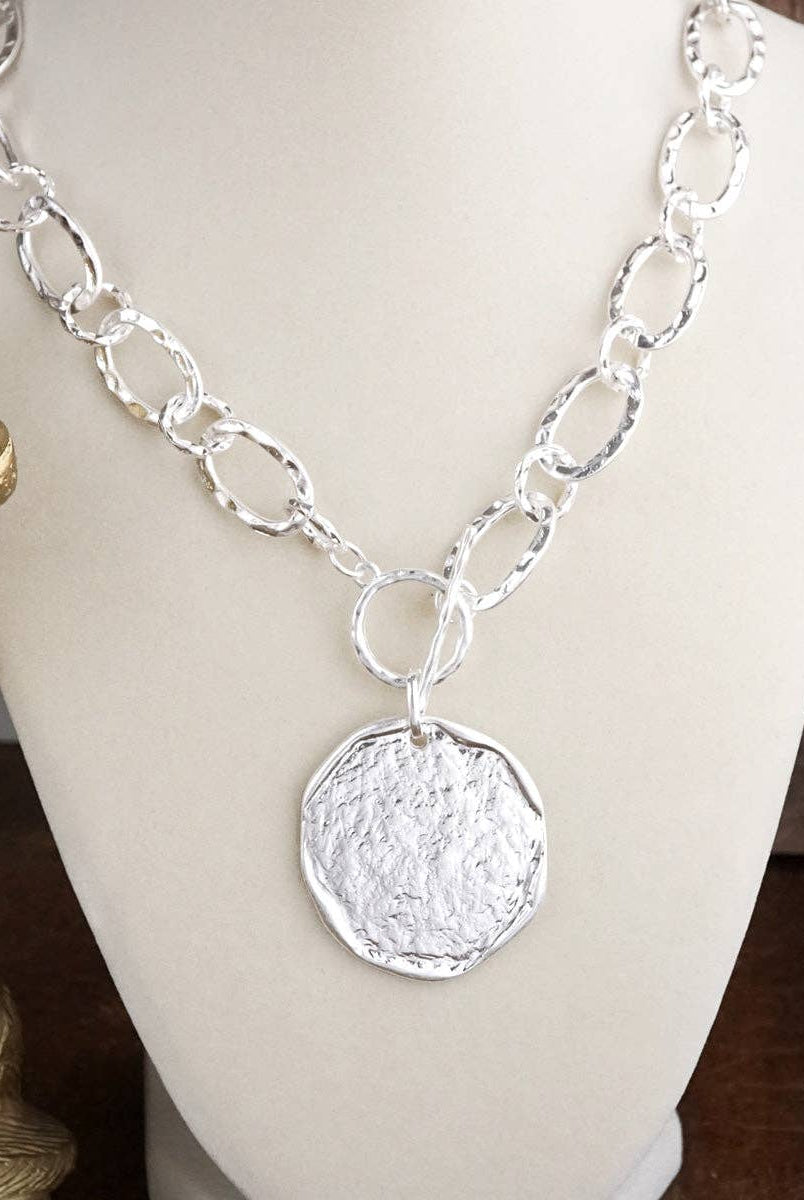 Nomad Glow – Front Toggle Statement Necklace with Hammered Disc-Necklaces-PennyLine inc-Stuffology - Where Vintage Meets Modern, A Boutique for Real Women in Crosbyton, TX