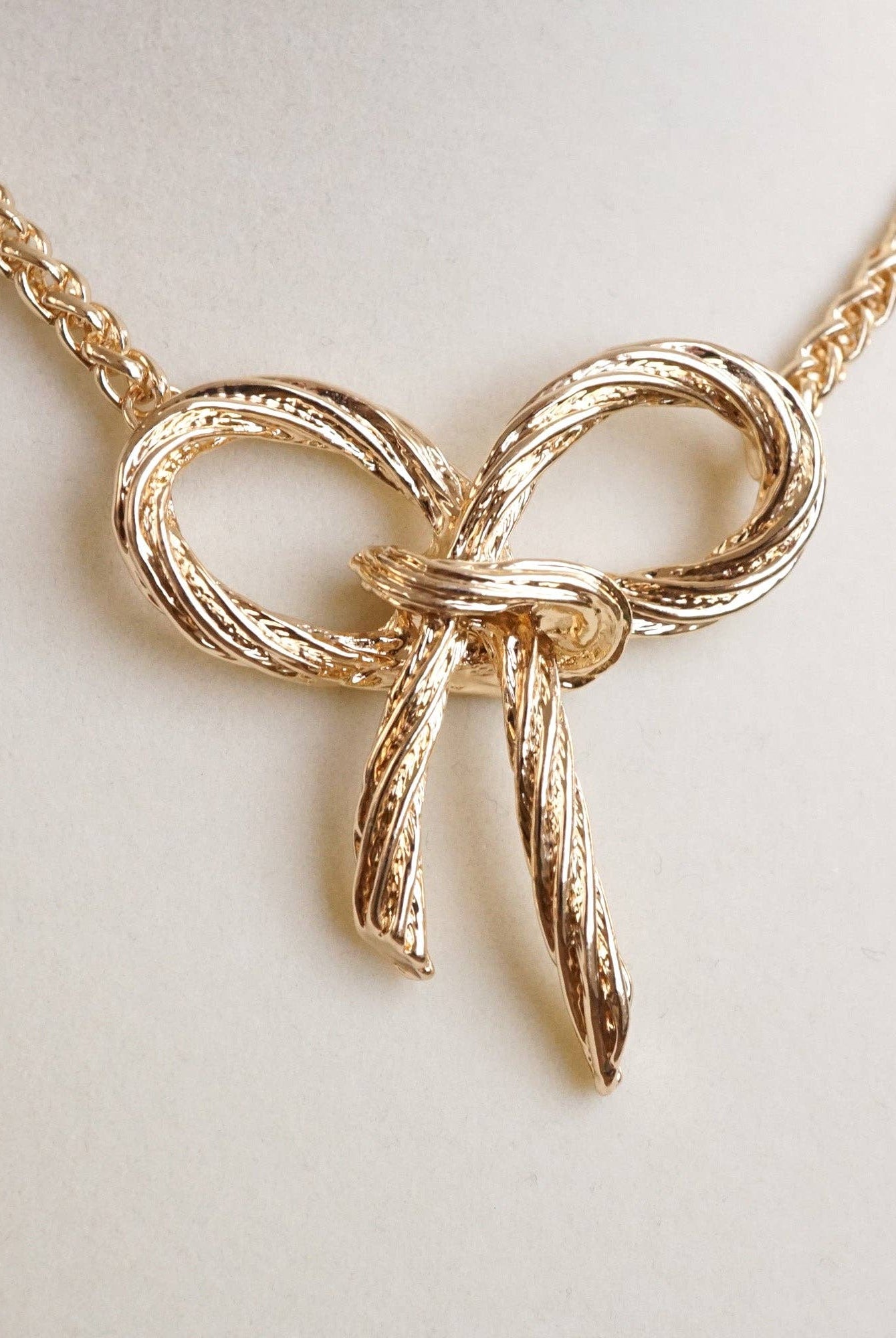Large Rope Textured Bow Pendant Statement Necklace Silver Tone-Necklaces-PennyLine inc-Stuffology - Where Vintage Meets Modern, A Boutique for Real Women in Crosbyton, TX