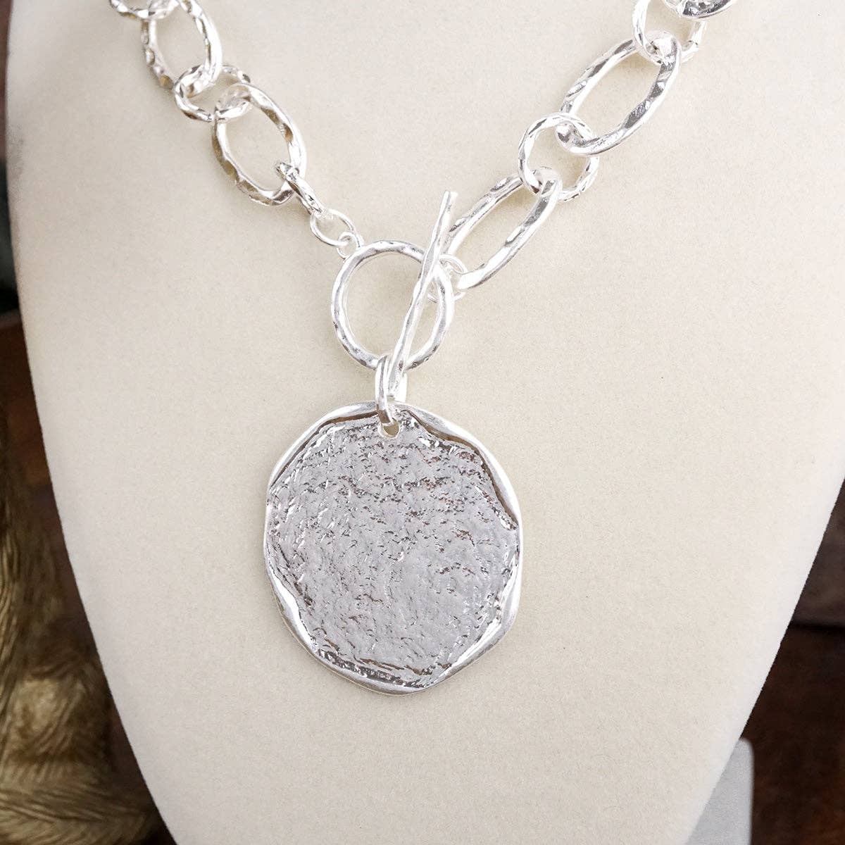 Nomad Glow – Front Toggle Statement Necklace with Hammered Disc-Necklaces-PennyLine inc-Stuffology - Where Vintage Meets Modern, A Boutique for Real Women in Crosbyton, TX