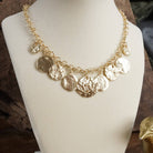 Textured Coins Statement Necklace – Gold Tone-Necklaces-PennyLine inc-Stuffology - Where Vintage Meets Modern, A Boutique for Real Women in Crosbyton, TX