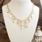 Radiant Faith – Mixed Charm Cascade Necklace in Gold Tone-Necklaces-PennyLine inc-Stuffology - Where Vintage Meets Modern, A Boutique for Real Women in Crosbyton, TX