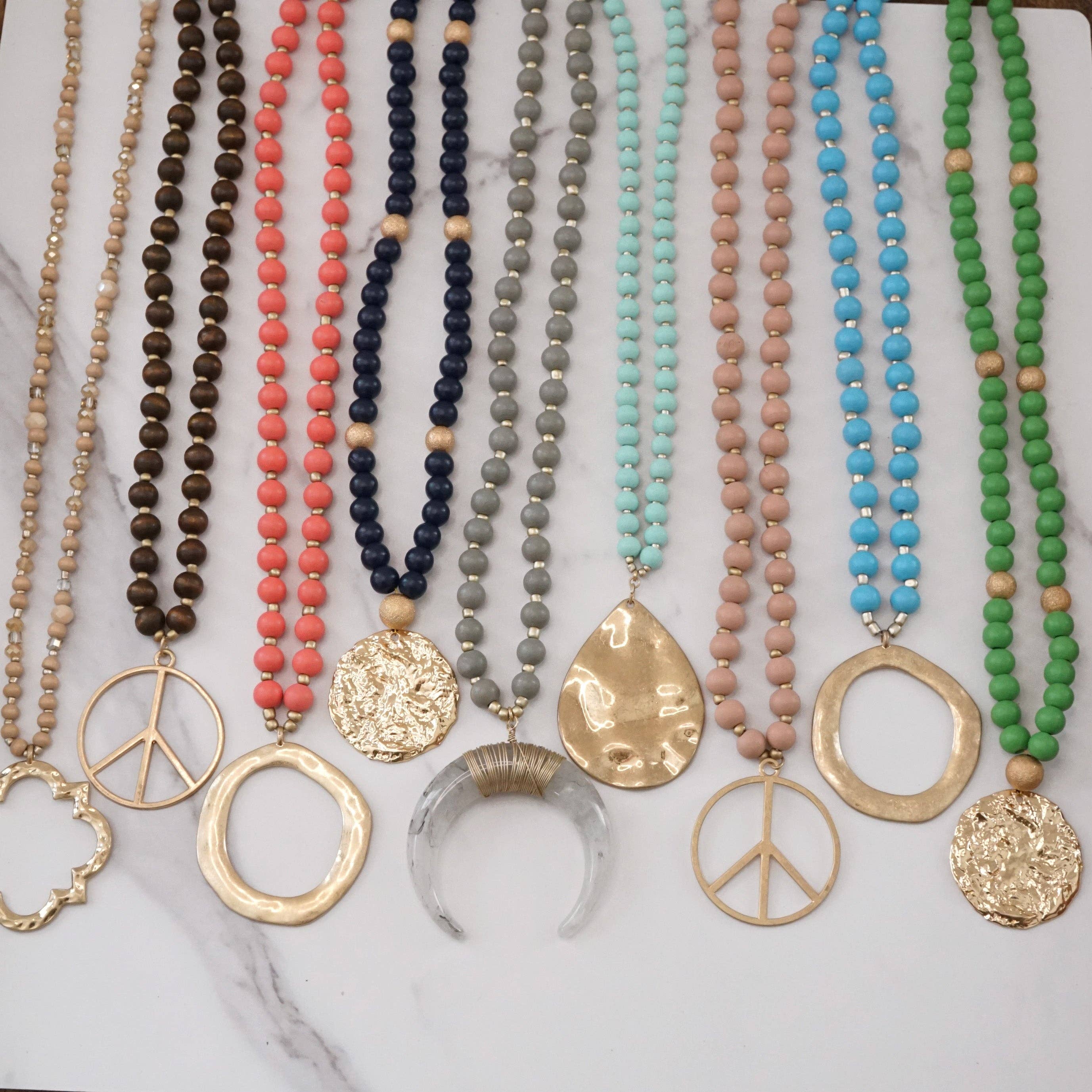Long Wood Bead Necklace with golden peace sign pendant - Gray-Necklaces-PennyLine inc-Stuffology - Where Vintage Meets Modern, A Boutique for Real Women in Crosbyton, TX
