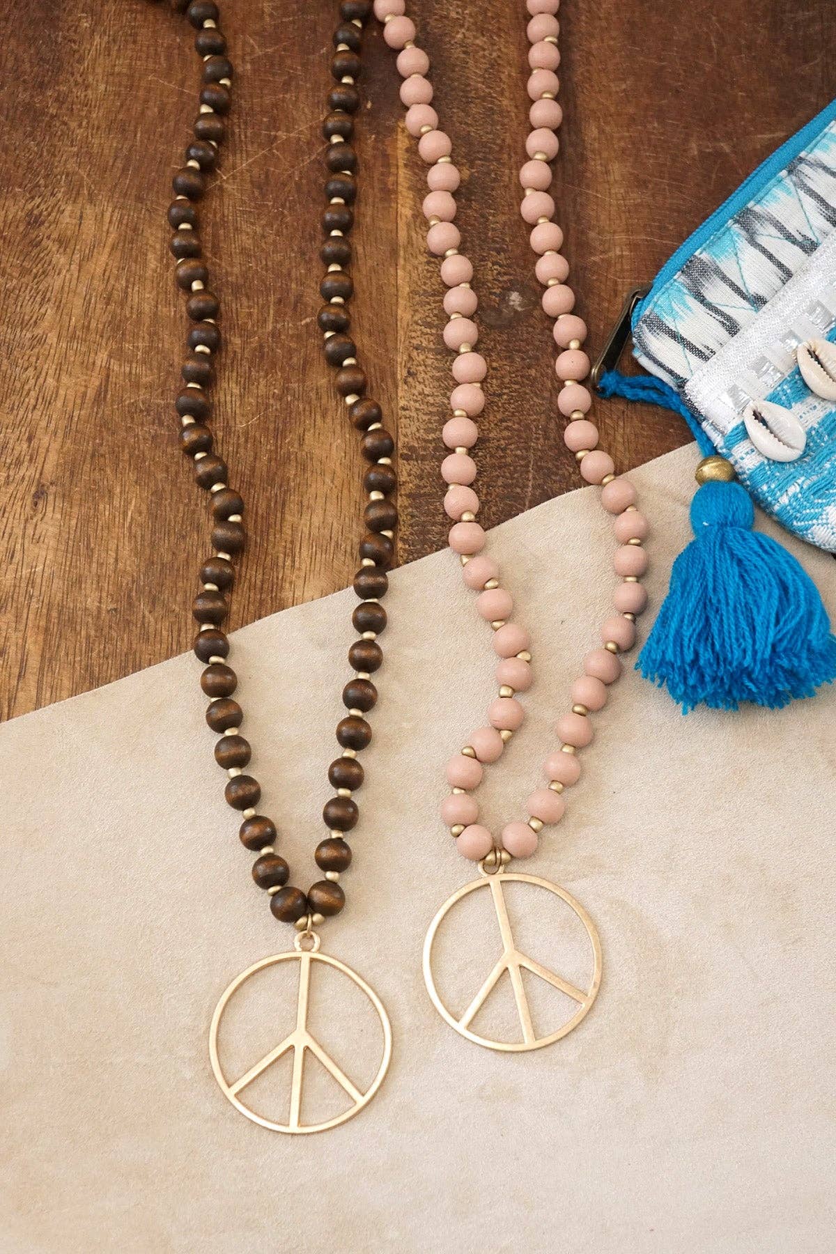 Long Wood Bead Necklace with golden peace sign pendant - Gray-Necklaces-PennyLine inc-Stuffology - Where Vintage Meets Modern, A Boutique for Real Women in Crosbyton, TX
