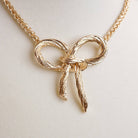 Large Rope Textured Bow Pendant Statement Necklace Silver Tone-Necklaces-PennyLine inc-Stuffology - Where Vintage Meets Modern, A Boutique for Real Women in Crosbyton, TX