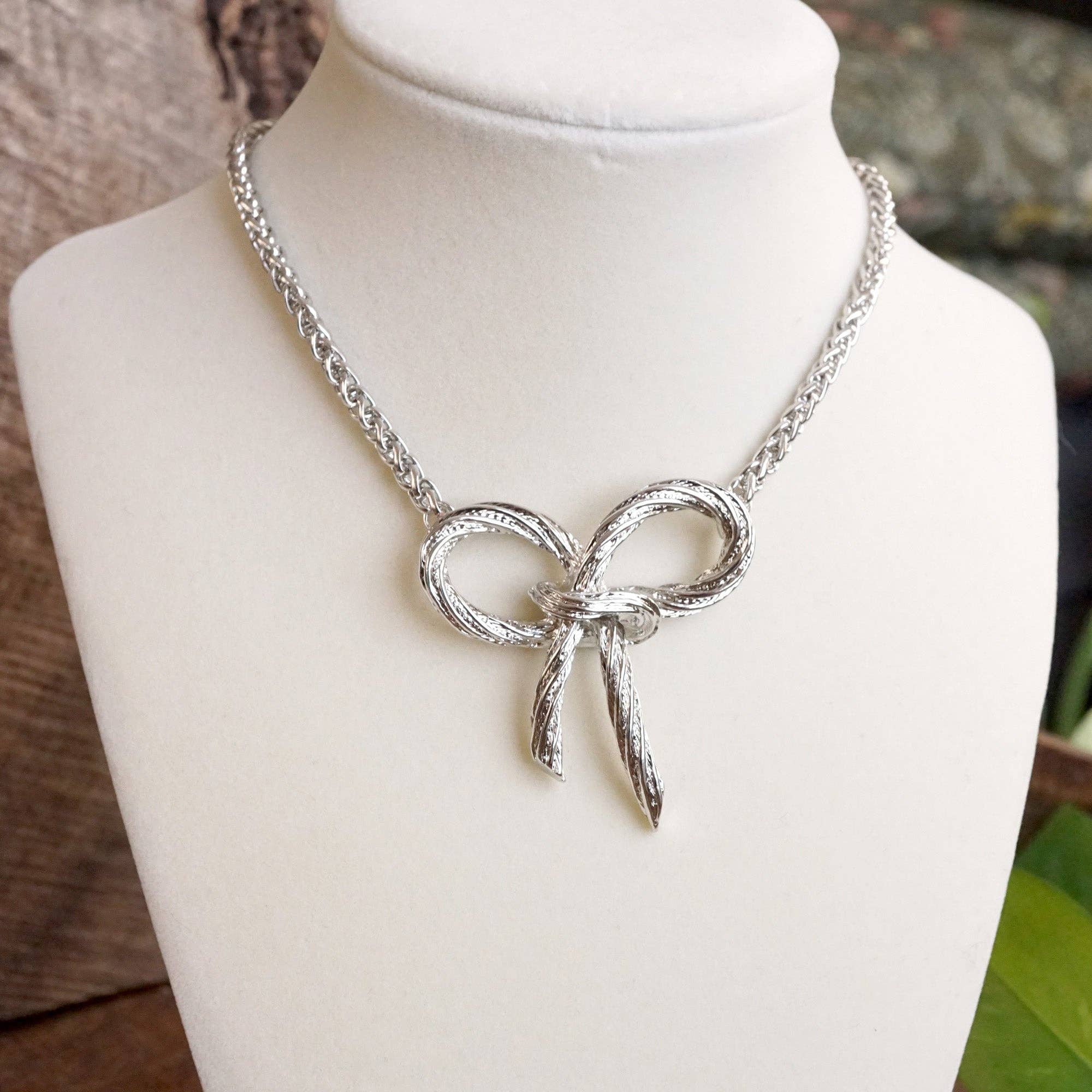 Large Rope Textured Bow Pendant Statement Necklace Silver Tone-Necklaces-PennyLine inc-Stuffology - Where Vintage Meets Modern, A Boutique for Real Women in Crosbyton, TX